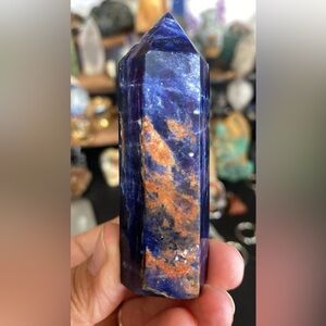Sodalite with sunstone point